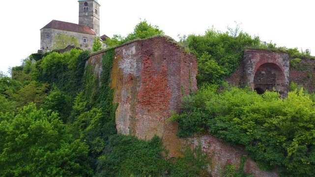 Tall Imposing Red Brick Wall at the Top of Hill Outside Gussing Castle