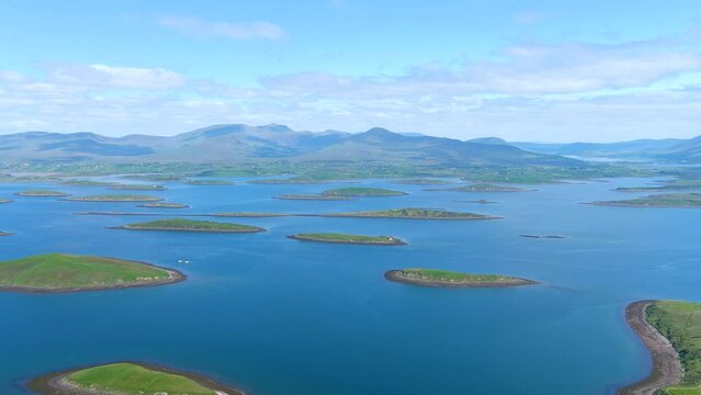 Aerial panorama of Clew Bay's archipelago of islands, partly drowned limestone drumlins formed by glacier. Aka Cuan Modha, one of nature's greatest spectacles when viewed from above. Co. Mayo, Ireland