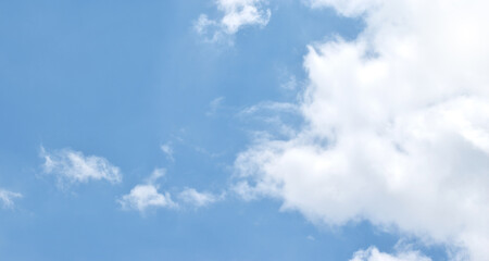 Obraz premium Light blue sky and white clouds. With copy space. panorama