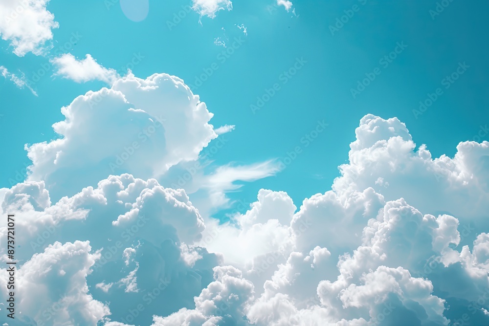Poster a sky with clouds and a plane, fluffy clouds floating across a blue sky, resembling cotton candy and