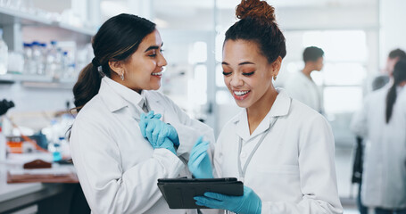 Science, happy team and tablet in lab for results, vaccine development or online feedback. Women, technology or excited for breakthrough with medical report, update or virus study for pharmaceuticals