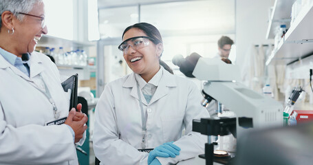 Women, laboratory and happy for science talk with technology for research, teamwork or support for...