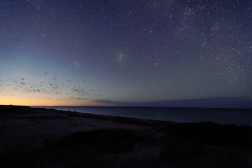 Ocean in the night time as the sun begins to rise