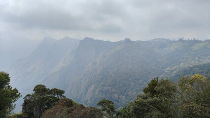 mountains and fog in the monsoon season in India. Lovely peaceful background 