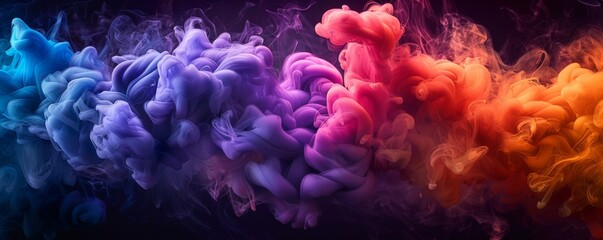 Obraz premium Colorful smoke explosion of vibrant colors in dark background