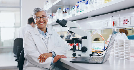 Portrait, scientist and mature woman on laptop in lab to research chemistry, test or innovation....