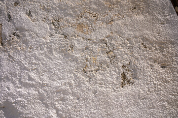 Old grunge white wall texture background.