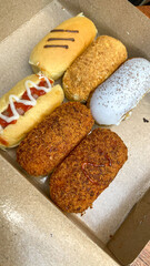 various breads with delicious fillings and toppings, have a smaller size in Indonesia known as...