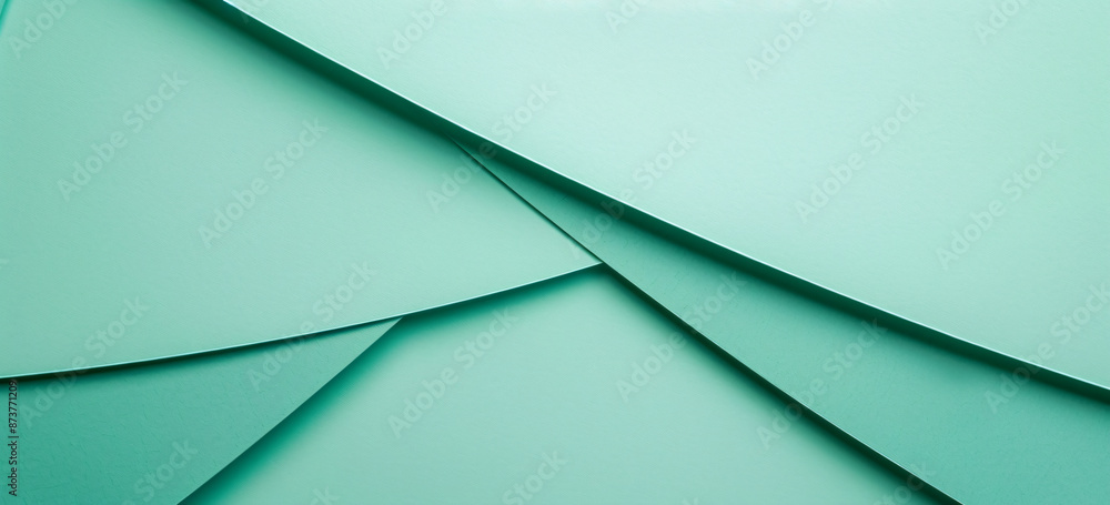 Poster photo of a minimalist mint green background with geometric shapes for design or text space. web bann