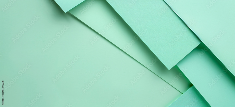 Poster photo of a minimalist mint green background with geometric shapes for design or text space. web bann