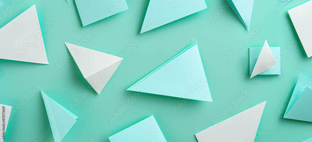 Poster photo of a minimalist mint green background with geometric shapes for design or text space. web bann