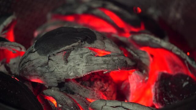 Roasted breadfruit in open fire, covered under coconut husk, traditional Seychelles food, Mahe, Seychelles 4k 24fps 001.