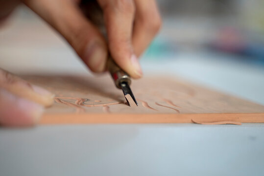 Close up of rubber / linoleum carving for relief printmaking