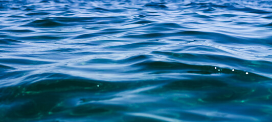 Blue ocean surface close up background