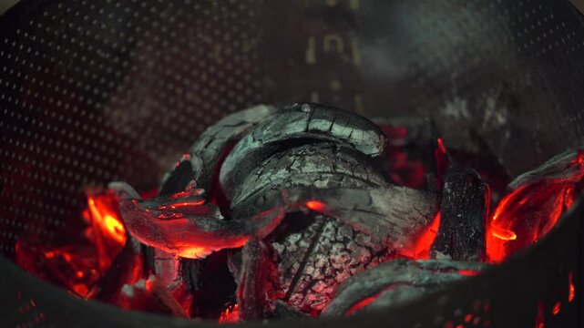 Roasted breadfruit in open fire, covered under coconut husk, traditional Seychelles food, Mahe, Seychelles 4k 24fps 003