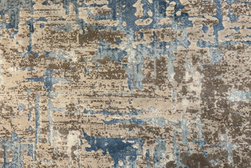 Random customized hand sewn carpet rug floor in shades of blue, light blue, brown, beige, and ivory color. Rug or carpet flooring bespoke seamless texture, unique luxurious random cross pattern.