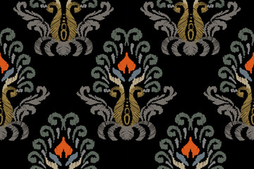 Ikat floral paisley embroidery on black background. Traditional ethnic ikat, aztec abstract vector pattern, seamless pattern in tribal, folk embroidery and mexican style.