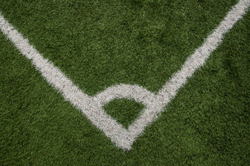 sport and game concept - close up of football field with line and grass