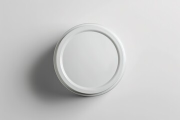 Minimalistic white round plate on solid background, top view.