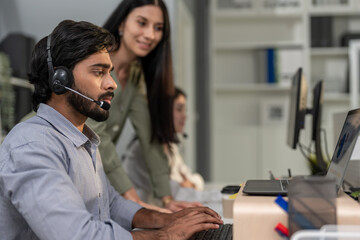 Asian professional businessman using laptop computer video call in office. 