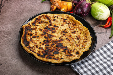 Indian cuisine stuffed Aloo paratha