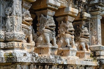 Close up of a wall adorned with a group of intricate statues and carvings from an ancient temple, An ancient temple with ornate carvings and statues depicting mythical creatures
