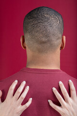 Hands on shoulders suggest intimate oral sex