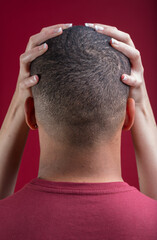 Hands hold head, symbolizing inclusivity and fluidity