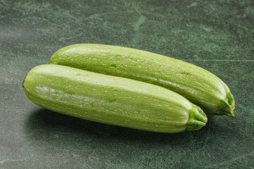 Raw green ripe zucchini vegetable
