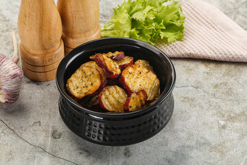 Baked red batat slices with herbs