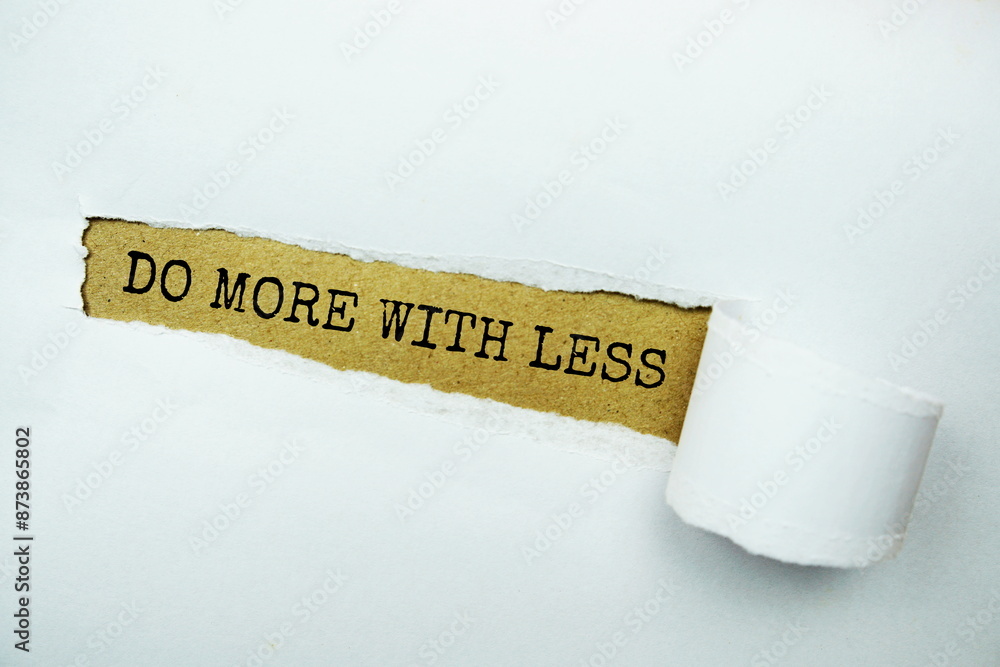 Poster do more with less message written on craft paper with torn paper background
