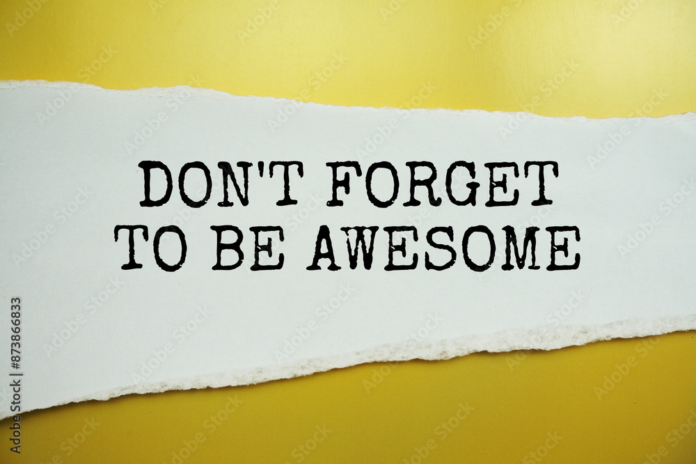 Poster don't forget to be awesomemessage written on white paper with torn paper background