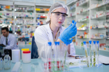 Chemical scientist doing antibiotic trials and testing in the laboratory