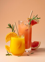 Orange and grapefruit juice with rosemary and ice.