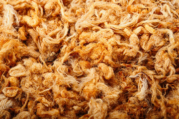 dried shredded pork on background texture