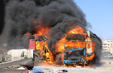 Trucks burned result of the bombing. The war on Gaza. Remnants of war