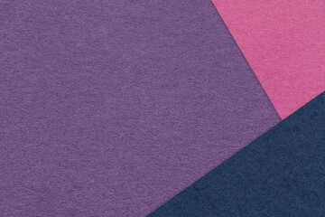 Texture of craft violet color paper background with purple and navy blue border. Vintage abstract lavender cardboard.