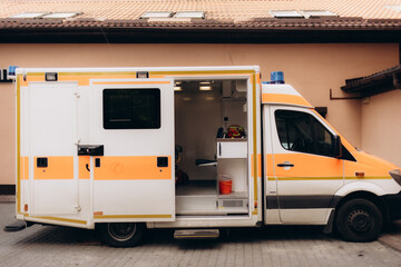 Ambulance with open doors. Emergency equipment and devices, ambulance interior details with...