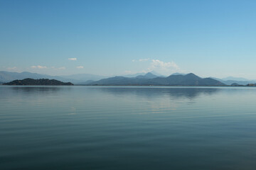 reflection of the forest in the lake.Bay views from green forests. View from the forest to the sea. Magnificent views from the forest to the sea. Magnificent bays of Muğla.