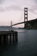 Golden Gate Bridge on dark overcast day. Landmark in San Francisco, California, USA