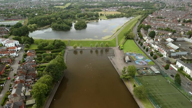 Aerial shot of The Waterworks in North Belfast, NI.

The camera travels forwards, over the water to reveal the aera.

Filmed in 4K, 60 frames per second and in Rec709 color.