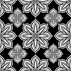 Intricate black and white floral pattern with symmetric geometric design for textile and wallpaper.
