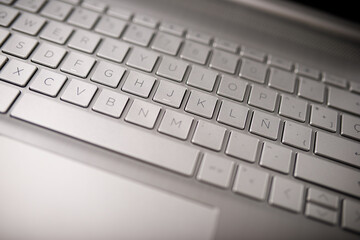 Close-up of the keyboard of a gray laptop computer