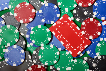Casino chips on a green mat