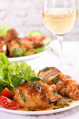 Chicken thigh with gravy and vegetable side dish