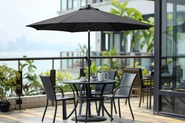Obraz premium Modern outdoor dining area with black umbrella and city views, creating a stylish and inviting space perfect for enjoying meals and scenic views.