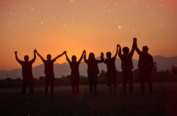 Silhouette of happiness and being free and relaxed in living life, success and working towards planned life goals.