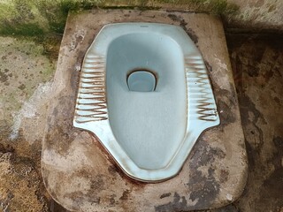 squat toilets that are dirty and full of crust