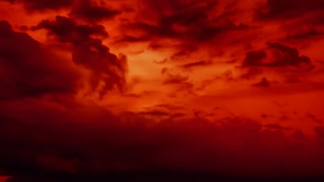 Majestic red skies at dusk with dramatic cloud formations