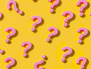 Pink question marks clustered on yellow background with central question mark uncertainty and curiosity in business and everyday life